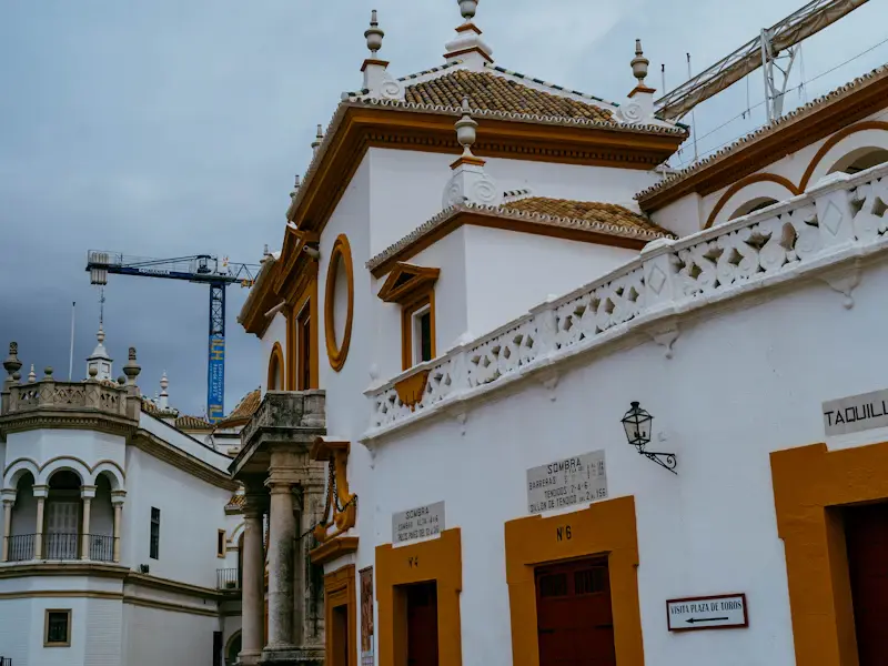 The white and ochre baroque façade of the Maestranza bullring