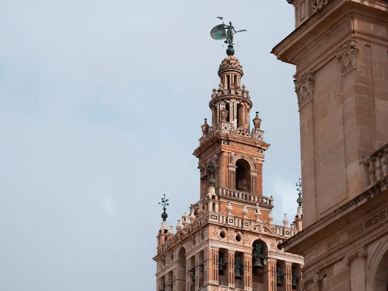 The ornate upper storeys of the Giralda