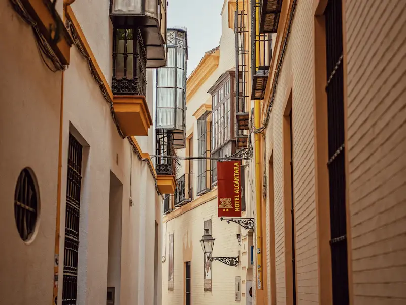 A narrow whitewashed lane in the Barrio de Santa Cruz